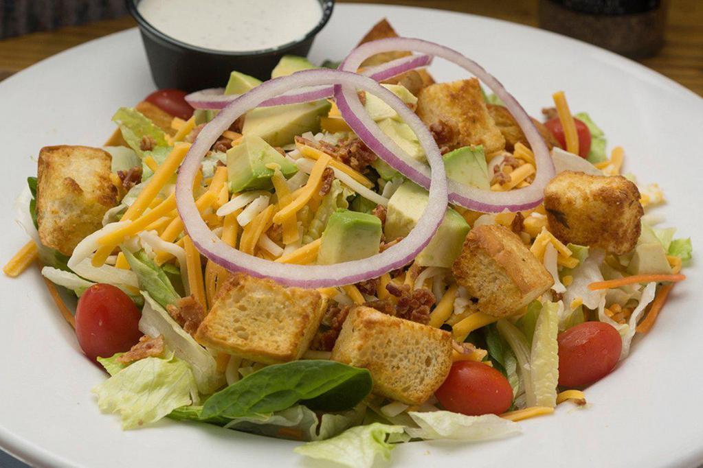 Joe’s Garden Salad · Lettuce, bacon, avocado, tomato, red onion, cheese, house made croutons, with choice of dressing.