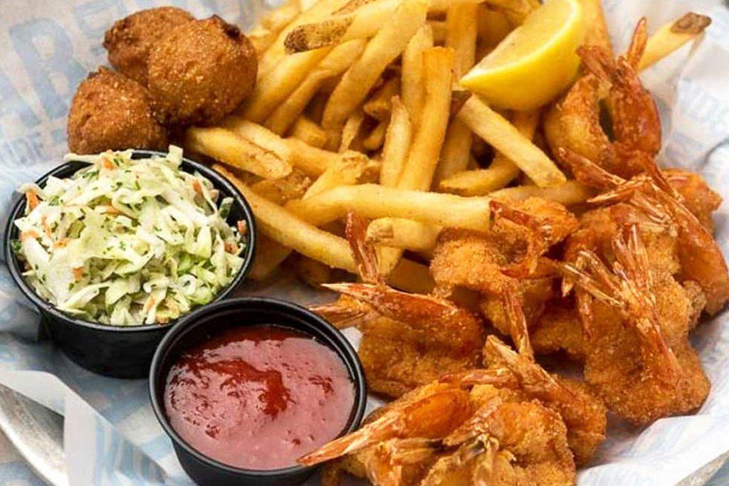 Crispy Fried Shrimp · With fries, coleslaw and hushpuppies.