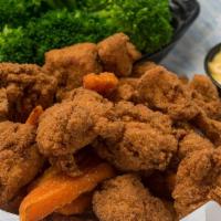 Chicken Tenders · Hand breaded white meat chicken. Served with fries, coleslaw and hush puppies.