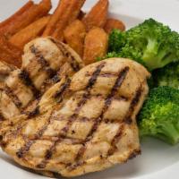 Grilled Herb Chicken · Chicken breasts topped with herb butter. Served over mashed potatoes and seasonal vegetables.