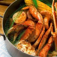 Joe’s Classic Steampot · Dungeness crab, sweet snow crab, shrimp and smoked sausage, Old Bay.