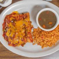 29. Ranchero Enchiladas · Topped with ranchero sauce and melted Jack cheese.