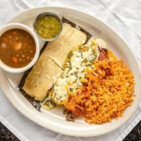 42. Pork Tamale · Pork tamale topped with meat sauce and 2 enchiladas of your choice.