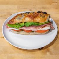 Caprese Prosciutto Sandwich · Tomato, fresh mozzarella, avocado, fresh basil in olive oil, balsamic dressing, and prosciut...