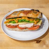 Grilled Chicken and Gouda Sandwich · Grilled chicken, Gouda cheese, avocado, tomato, paprika mayonnaise.