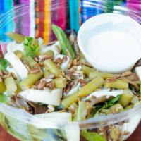 Dorada Salad · Greens, hearts of palm, pickled green beans, sunflower seeds and mustard vinaigrette.
