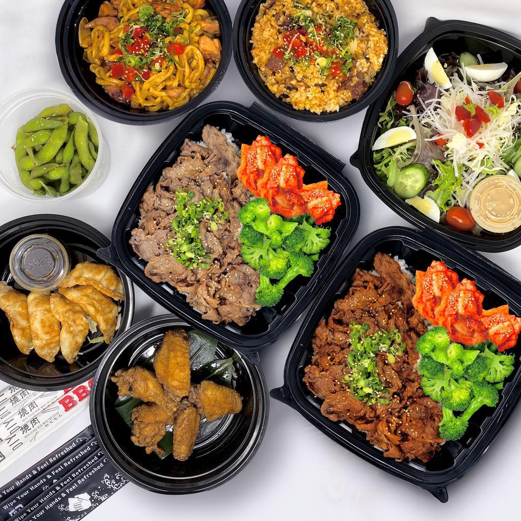 Gyu-Family Meal for All · Take a break and let us build your meal. We have put together some of our fan favorites to create a well-balance meal that feeds four. Substitutions respectfully declined. Includes: 1x Gyu-Bento with 7 oz Yaki-shabu Beef in Miso, 1x Gyu-Bento with 7 oz Toro Beef in Sweet Soy Tare, 1x Sukiyaki Beef Fried Rice, 1x Garlic Noodles with Chicken, 1x Black Pepper Wings, 1x Fried Pork Gyoza Dumplings, 1x Gyu-Kaku Salad, 1x Edamame