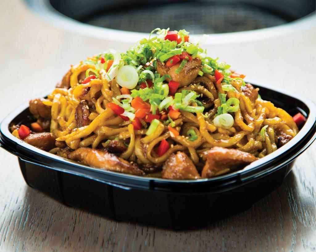 MEGA Garlic Noodles with Chicken · A TRIPLE SERVING of our Crowd Favorite: Mega Garlic Noodles with Chicken. Serves 3-5 people. Thick Japanese noodles stir-fried with chicken, sliced garlic, butter, and soy sauce. Topped with diced red bell peppers, chopped green onions, and sesame seeds.
