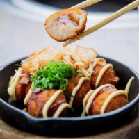 Takoyaki · Fried Octopus Balls! A street food classic straight from Osaka. Six fried octopus fritters d...