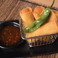 Vegetable Spring Rolls · Four (4) Fried Vegetable Spring Rolls with Sweet Chili Dipping Sauce on the side.