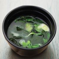 Miso Soup · A cup of our classic Miso Soup with seaweed, tofu, and chopped green onions.
