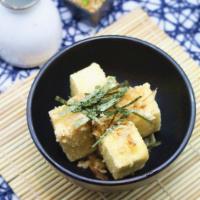 Agedashi Tofu · Fried tofu served in tempura broth with bonite flakes. 