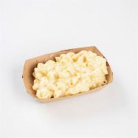 Mac N Cheese · Large elbow pasta in a creamy housemade bechamel. Vegetarian.