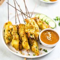 4 Piece Chicken Satay · Grilled marinated chicken tender. Served with peanut sauce and cucumber salad.