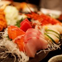 6 Piece Sashimi  · Raw. Chef's selection of raw fish.