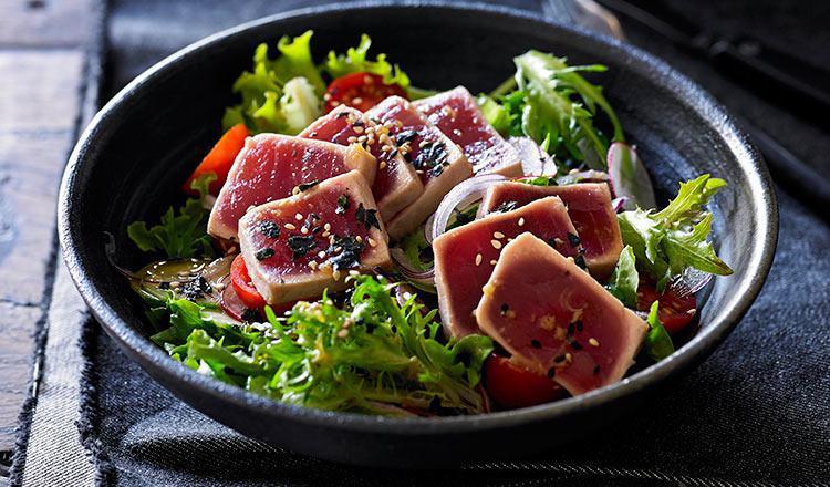 Ahi Tuna Tataki  · Seared thin sliced tuna with ponzu sauce.