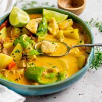 Gang Garee  · Yellow curry dish. A yellow curry paste with coconut milk, potatoes, carrots, bell peppers a...