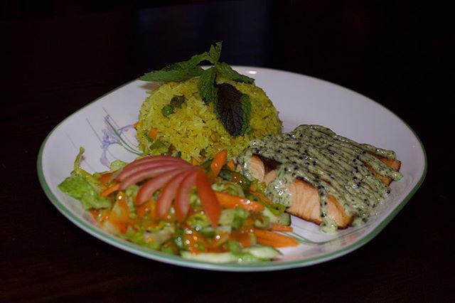 Grilled Salmon · 8 oz. grilled salmon with dill sauce. Served with greens salad and pulau pan-fried mixed vegetable fried rice in butter.
