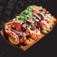 Kamikaze Fries · Crisscut waffle fries topped with minced Korean BBQ beef, kimchi, Japanese mayo, red sauce, ...