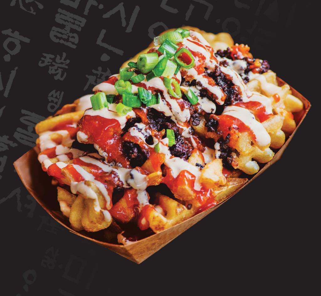 KAMIKAZE FRIES · Crisscut waffle fries, minced Korean BBQ beef, kimchi, red sauce, Japanese mayo, green onions. Vegetarian option is available.