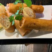 Fried Egg Rolls · Comes with 3 crispy fried egg rolls. A combination of pork and shrimp; served with kimchi an...