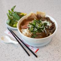 1. House Special Pho · Rice noodles with rare sliced eye round steak, well-done briskets and flanks, tendons and tr...