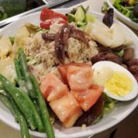 Nicoise Salade · Tuna, cucumber, artichoke, haricot vert, egg, tomato, anchovies and potatoes with mustard vi...