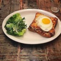 Croque Madame · Warm ham, Gruyere cheese and bechamel. Topped with a farm egg.