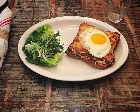 Croque Madame · Warm ham, Gruyere cheese and bechamel. Topped with a farm egg.