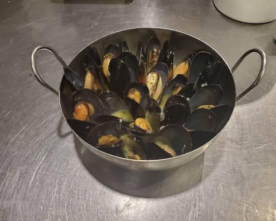 Moules Mariniere and Frites Plate · Steamed mussels in white wine, garlic and parsley french fries.