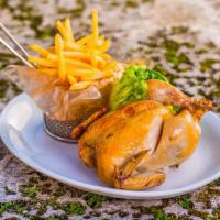 Demi Poulet Roti Plate · 1/2 rotisserie chicken, pan jus and mashed potatoes.