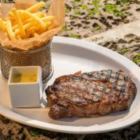 Entrecote Frites Plate · Grilled ribeye steak with french fries and bearnaise sauce.