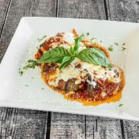Eggplant Rollatini · Lightly battered eggplant stuffed with ricotta, covered with sauce and melted mozzarella.
