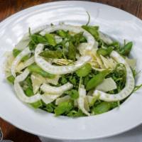 Arugula Salad · Arugula, shaved fennel, shaved Parmesan and asparagus with a lemon vinaigrette dressing.