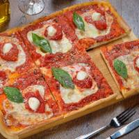 Mamma Mia Pizza · Fresh mozzarella, plum tomato sauce and basil.