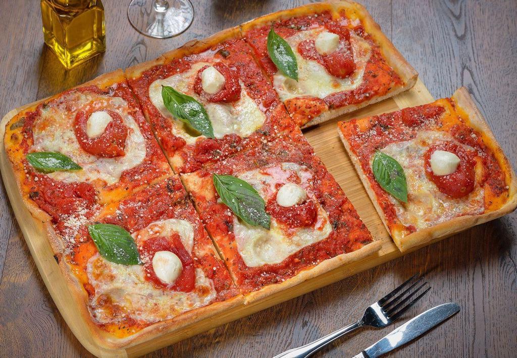 Mamma Mia Pizza · Fresh mozzarella, plum tomato sauce and basil.