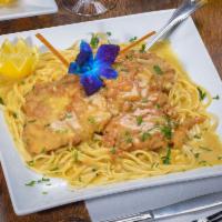 Chicken Francese · Lightly battered, sauteed in lemon and white wine sauce.