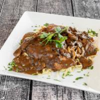 Veal Marsala · Tender veal in a classic Marsala wine sauce with fresh mushrooms and shallots.