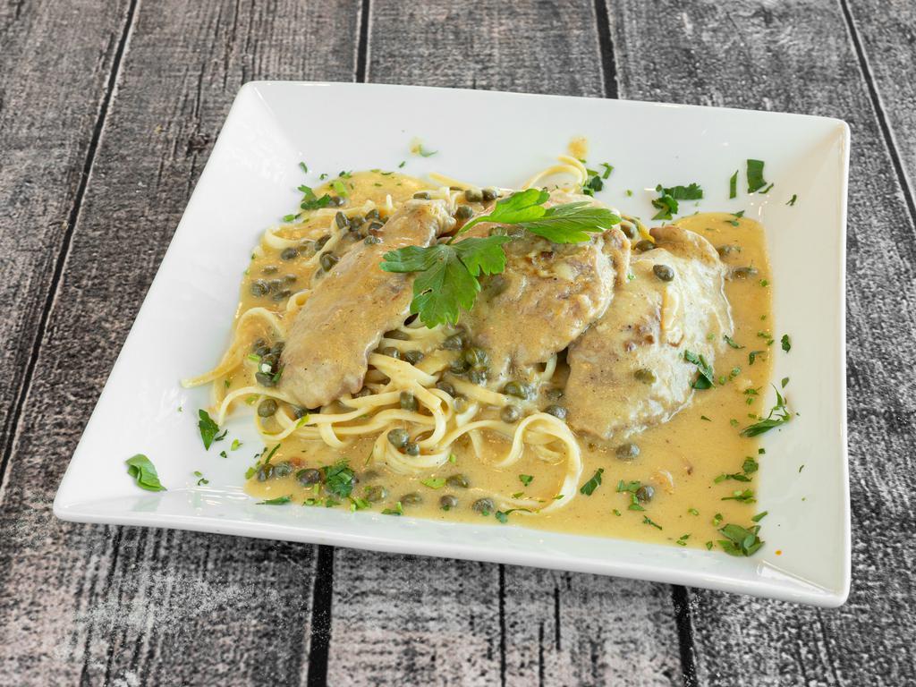 Veal Piccata · Veal sauteed in a white wine, lemon and capers.
