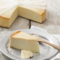 Cheesecake · Traditional New York cheesecake flavored with a hint of vanilla, on a sponge cake base.