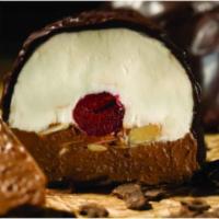 Bomba · Classic vanilla and chocolate gelato separated by a cherry and sliced almonds covered in cin...
