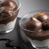 Profiteroles in a Glass · Cream puffs surrounded by vanilla and chocolate cream
