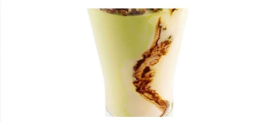 Coppa Pistachio · Custard gelato swirled with chocolate and pistachio gelato topped with praline pistachios.