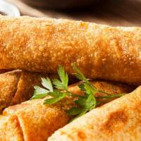 Egg Roll · Crispy dough filled with minced vegetables.