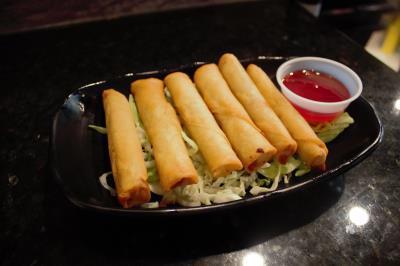 6 Piece Lumpia · Filipino style mini egg rolls filled with pork and veggies. Comes with a side of sweet and sour sauce.