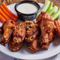 Chicken Wings · Buffalo chicken wings, celery, carrots and blue dressing or ranch dressing.