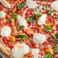 Margherita Pizza · Fresh mozzarella, sliced tomato and fresh basil.