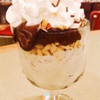Hot Fudge Sundae · Almonds, our awesome homemade hot fudge, whipped cream and sprinkles.