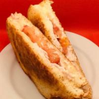 Turkey Melt Sandwich · Turkey, tomato, Jack cheese grilled on Bordenaves sliced sourdough. Avocado if you desire.