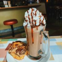 Hot Chocolate · Let us put you in the comfort zone...steamed milk with Ghirardelli chocolate powder and a to...